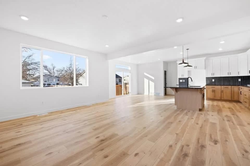 Bright open-plan hardwood floor · Client project