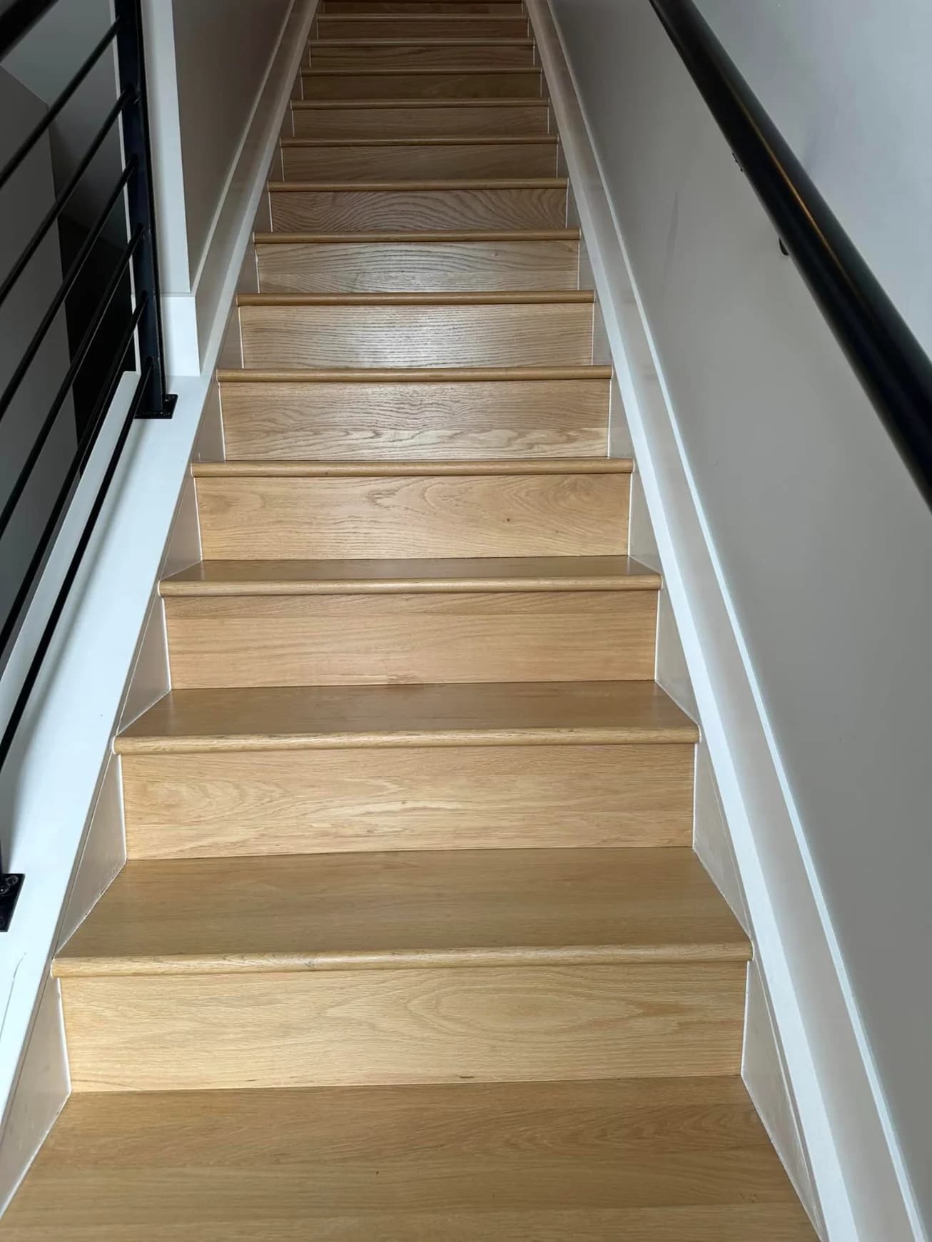White oak stair treads & risers — installed and finished on site